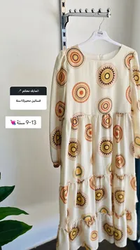 فستان بناتي محير بنقوش دائرية