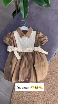 فستان أطفال بني بياقة بيضاء