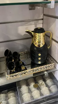 طقم قهوة فاخر ذهبي وأسود