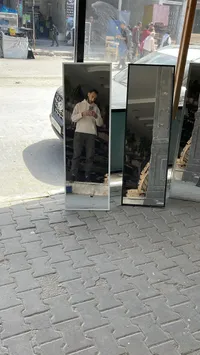 مرآة أرضية بإطار معدني