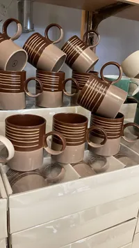 مج نسكافيه سيراميك بتصميم مخطط