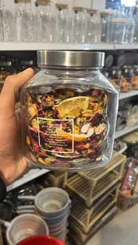برطمان تخزين زجاجي مع غطاء معدني
