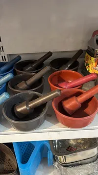 هاون بلاستيكي مع يد للهرس