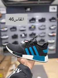 حذاء رياضي شبابي - إن إم دي من أديداس (Adidas)