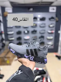 حذاء رياضي شبابي - إن إم دي من أديداس (Adidas)