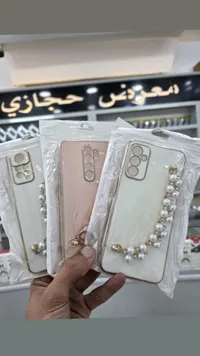 غطاء حماية للهاتف مزين باللؤلؤ