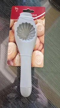 أداة تشكيل الكيك بتصميم الأصداف