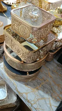 مجموعة صناديق تخزين ذهبية مزخرفة بتصاميم إسلامية