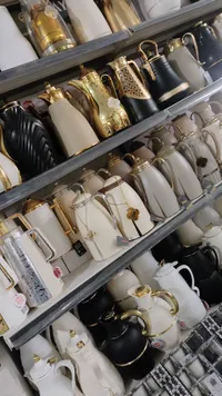 ترمس سيراميك بمقبض ذهبي