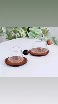 طقم أكواب زجاجية مع قواعد خشبية