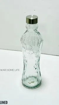 زجاجة مياه زجاجية بتصميم ملتوي - وار هوم لايف (War Home Life)