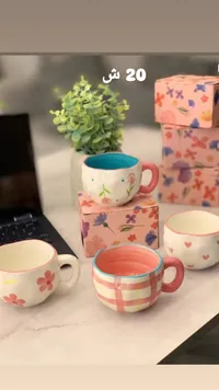 مج سيراميك بتصاميم زهرية ملونة - سوق غزة