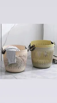 سلة غسيل بلاستيكية دائرية بمقابض