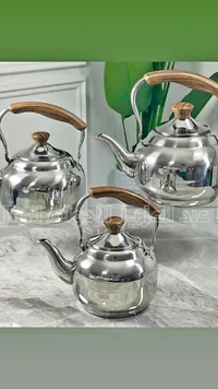 طقم غلايات ستانلس ستيل بمقابض خشبية