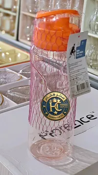 مطرة مياه رياضية شفافة بغطاء برتقالي
