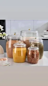 برطمانات تخزين زجاجية بغطاء مزخرف