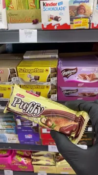 بسكويت محشو بكريمة الكاكاو والبندق - بافي (Puffy)
