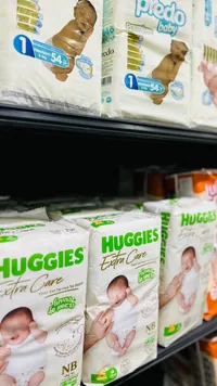 حفاضات إكسترا كير لحديثي الولادة - هاجيز (Huggies)