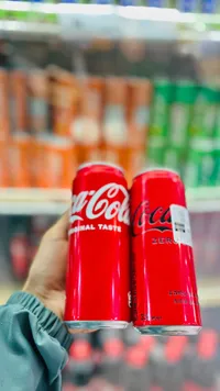 مشروب غازي كوكاكولا - كوكاكولا (Coca-Cola)