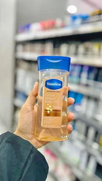 زيت الجسم كوكوا راديانت للعناية المركزة - فازلين (Vaseline)