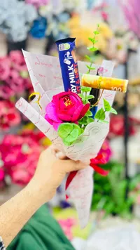 باقة ورد وشوكولاته ميلك