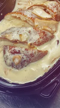 أسماك بصلصة كريمية