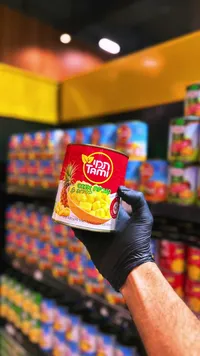 أناناس مقطع في شراب خفيف - تامي (Tami)