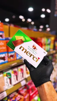 شوكولاتة بالحليب مع اللوز والبندق - ميرسي (Merci)