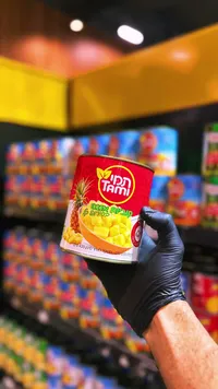 أناناس مقطع في شراب خفيف - تامي (Tami)