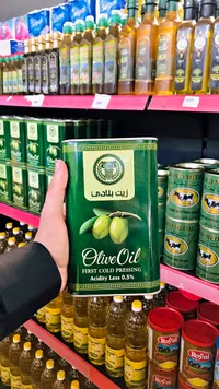 زيت زيتون بكر ممتاز - بلادي