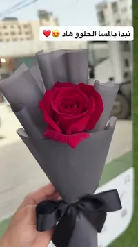 باقة وردة واحدة - تغليف أسود أنيق