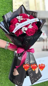 باقة ورد أحمر لعيد الميلاد