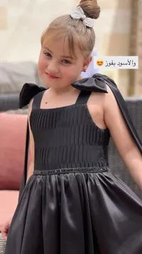 فستان سهرة أسود للبنات بفيونكات