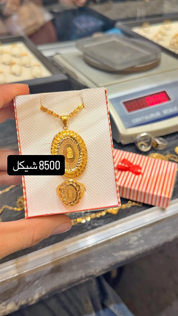 طقم قلادة وخاتم ذهب عيار 21 بتصميم فيرساتشي - مجوهرات - سوق غزة