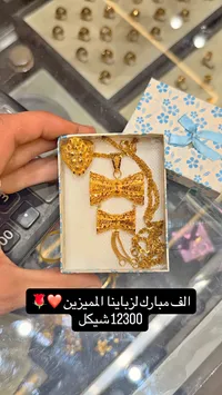 طقم ذهب عيار 21 بتصميم الفيونكة - سوق غزة