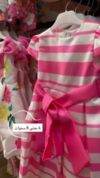فستان بناتي مخطط باللون الوردي