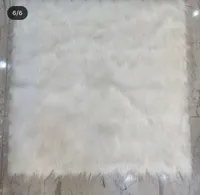 سجادة فرو بيضاء