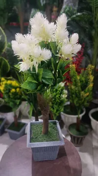 نبتة زينة صناعية - أزهار بيضاء