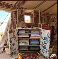 خزانة ملابس خشبية بأبواب نسيج
