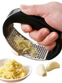 مبشرة الثوم اليدوية - أداة مطبخ