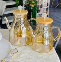 طقم إبريق شاي وقهوة زجاجي ذهبي