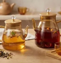 إبريق شاي زجاجي بغطاء خشبي