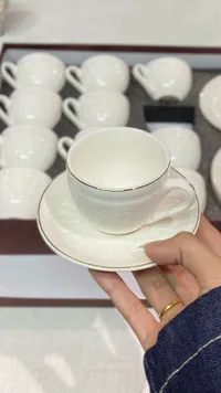 طقم فناجين قهوة بورسلين أبيض مع صحون