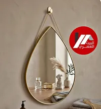 مرآة حائط بتصميم قطرة ذهبية - البيت العصري