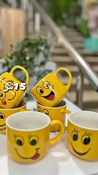مج سيراميك بتصاميم الإيموجي المبتسمة - سوق غزة