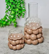 كوب وقنينة بتصميم فقاعات