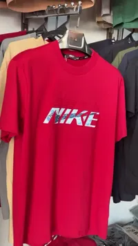 تيشيرت رجالي أحمر بشعار نايكي (Nike)