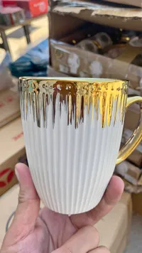 كوب سيراميك فاخر بتصميم مموج ومذهب
