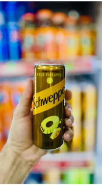 مشروب غازي بالأناناس الذهبي - شويبس (Schweppes)