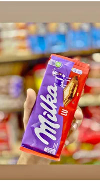 شوكولاتة بالحليب مع بسكويت لو - ميلكا (Milka)